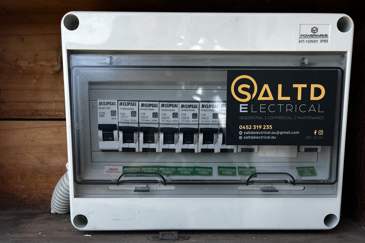 Replacement switchboard in a sealed IP65 enclosure with a Clipsal RCBO on every circuit, labelled and certified by SALTD Electrical